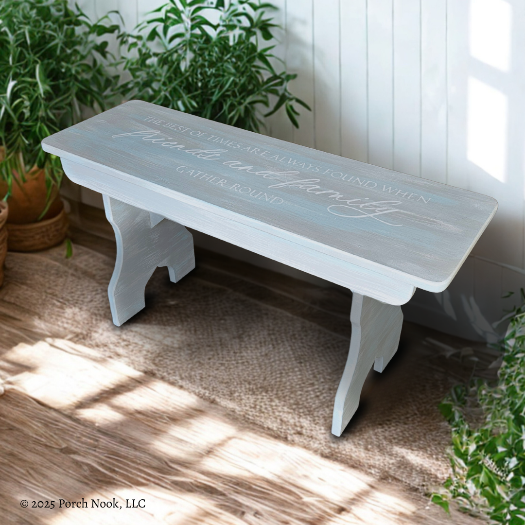 Vintage Solid Wood Bench, Hand-Painted Coastal Style with Quote in a sunlit room with plants