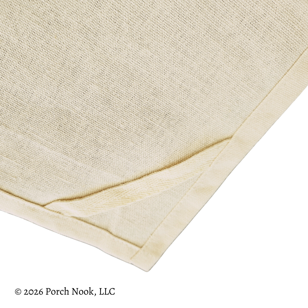 Beige tea towel with structured hanging loop detail