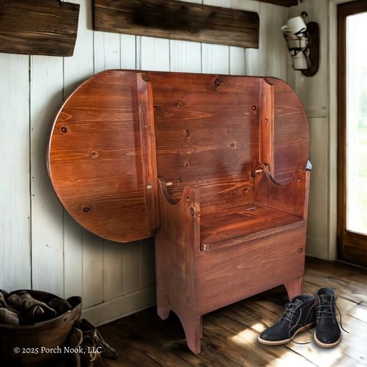 Vintage Pennsylvania Dutch Convertible Tilt-Top Table with Bench Seat and Storage - Wooden bench against a white paneled wall with shoes on the floor.