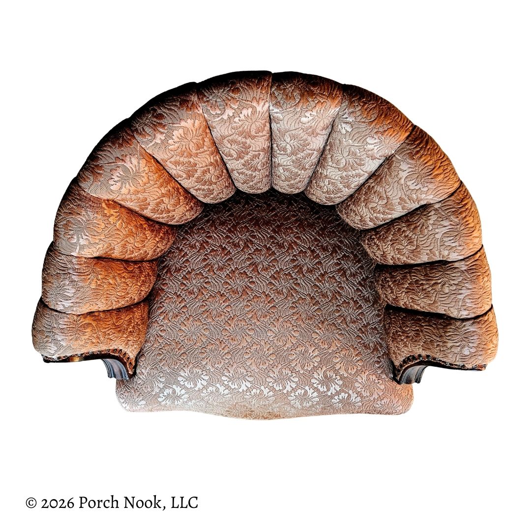 Top view of a decorative chair with intricate patterns on a white background