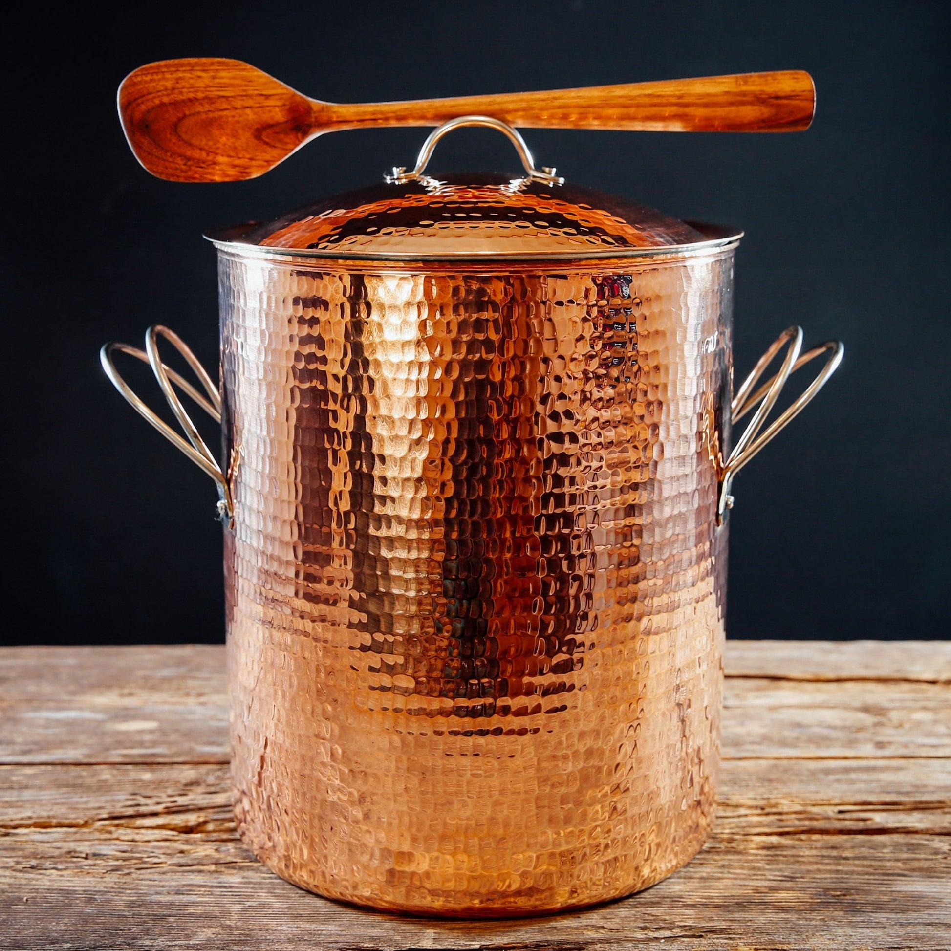 A copper stock pot is used for cooking soups, stews, broths, stocks, and large-batch meals that require steady, even heat distribution over longer cooking times.