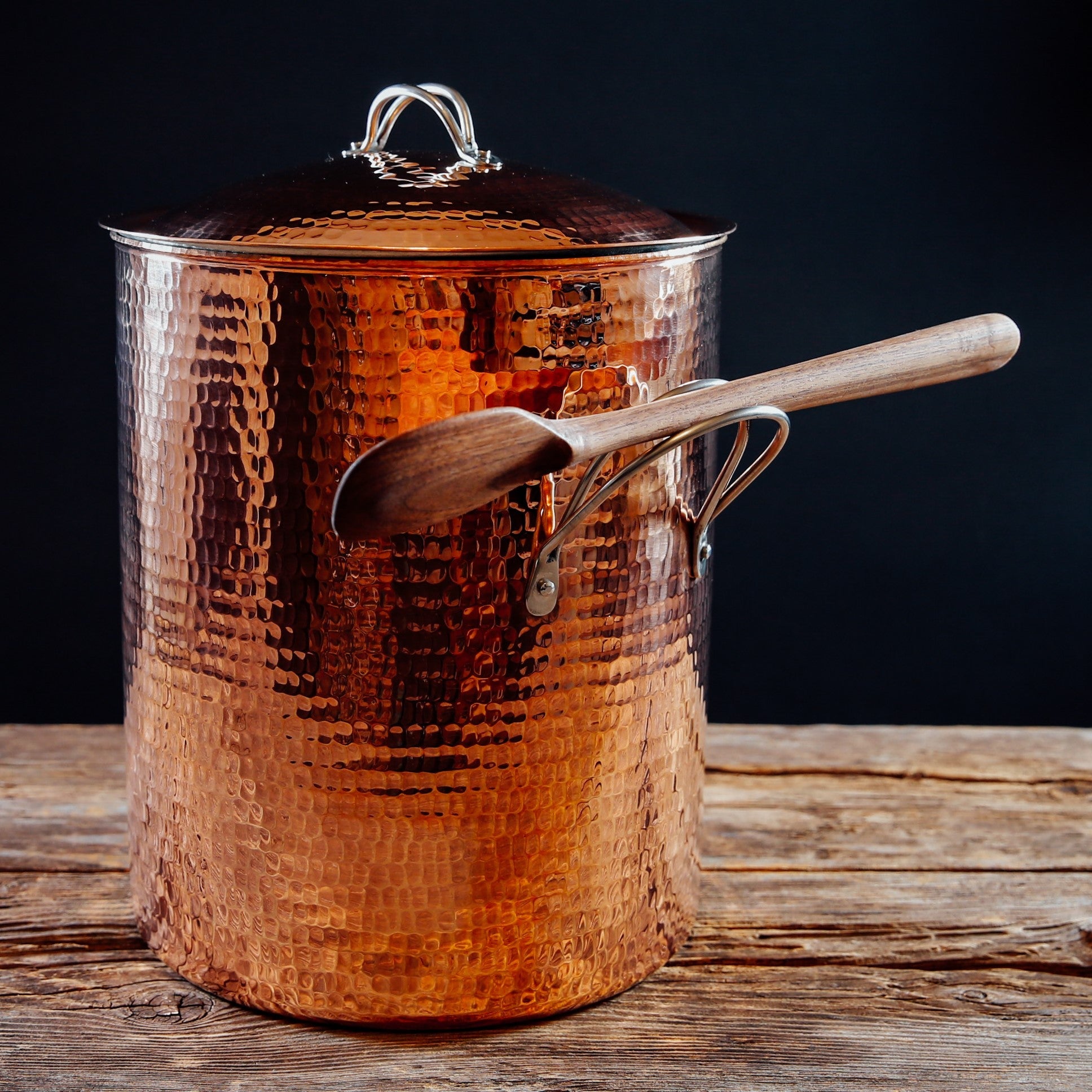 A copper stock pot is used for cooking soups, stews, broths, stocks, and large-batch meals that require steady, even heat distribution over longer cooking times.