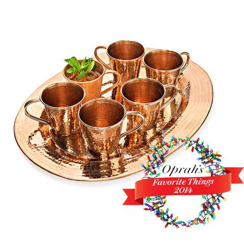 Set of copper mugs and tray with 'Oprah's Favorite Things 2014' label.