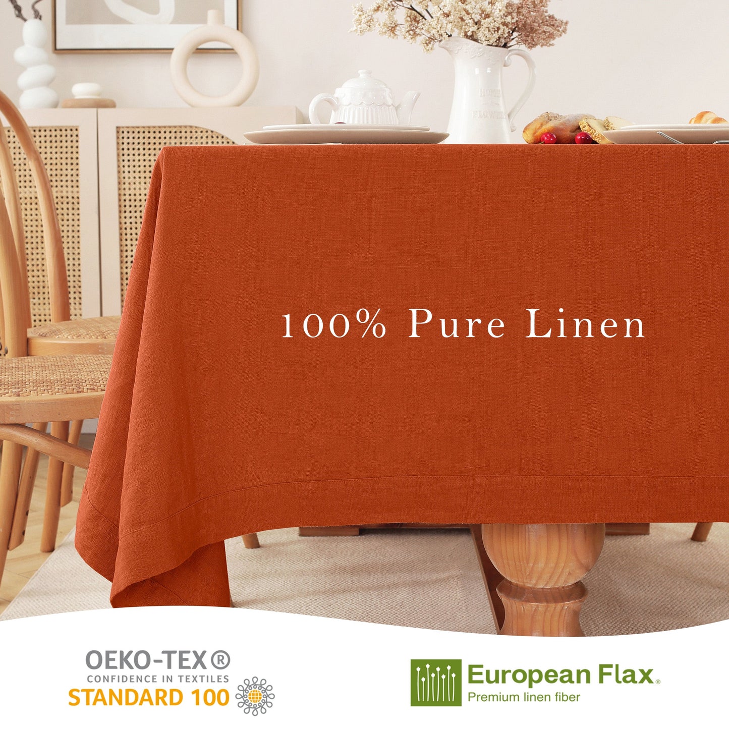 An orange-brown linen tablecloth draped over a table in a styled dining room setting, with white text reading '100% Pure Linen' across the center. A white curved banner at the bottom displays OEKO-TEX Standard 100 and European Flax logos.