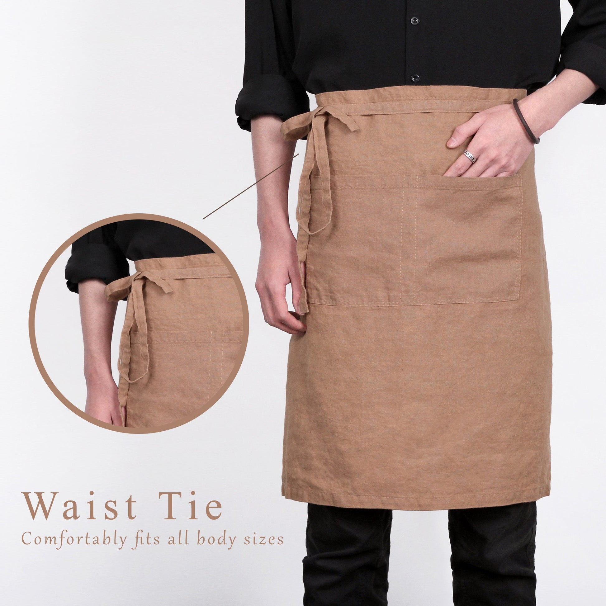 A person wearing a tan linen apron with a waist tie, paired with a black shirt and black pants, against a white background. A circular inset highlights the waist tie detail, and text at the bottom reads 'Waist Tie Comfortably fits all body sizes'.