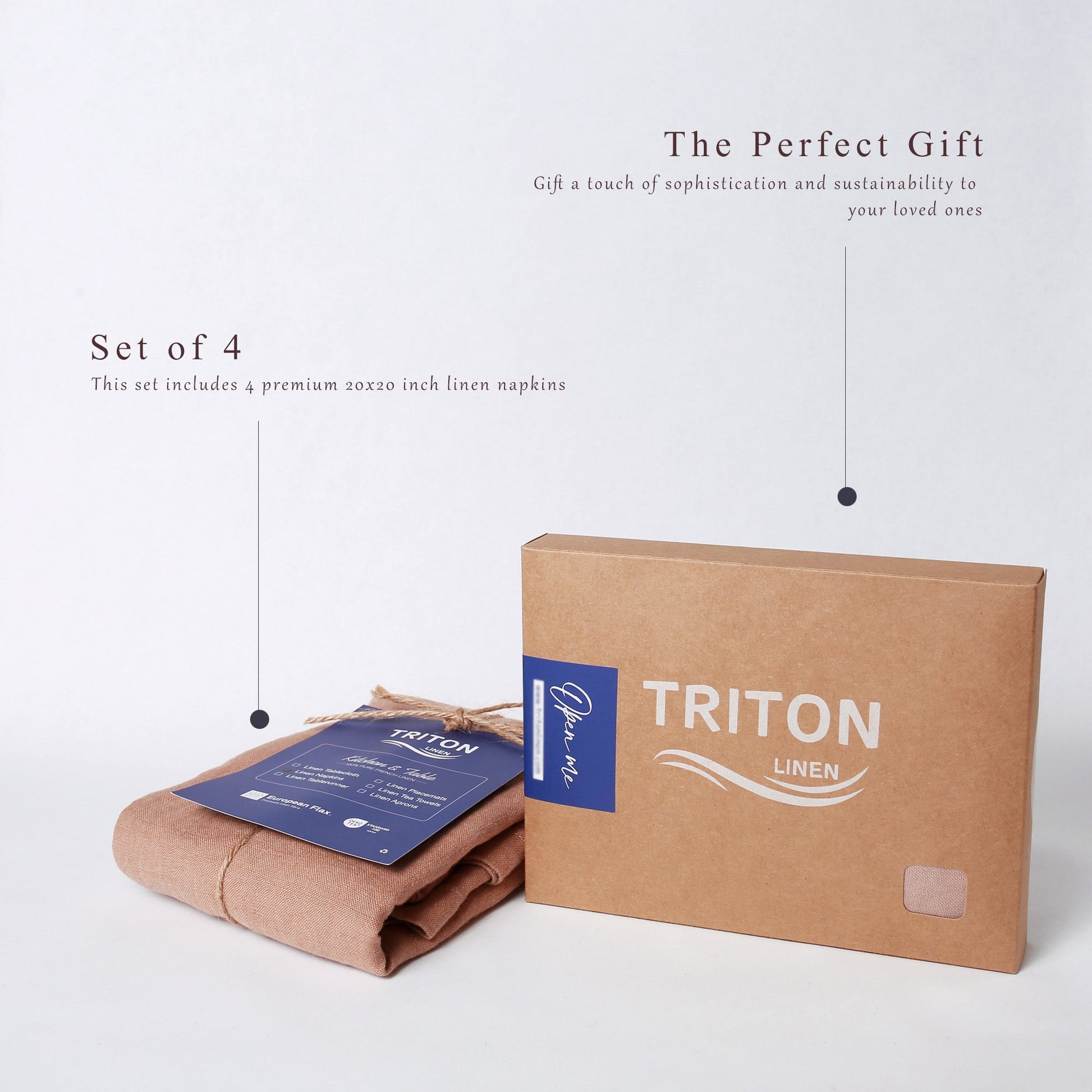 A set of four brown kraft paper napkins with blue labels, displayed next to their branded brown cardboard box on a clean white background. Text overlays describe the set as 'The Perfect Gift' containing premium 20x20 inch linen napkins.