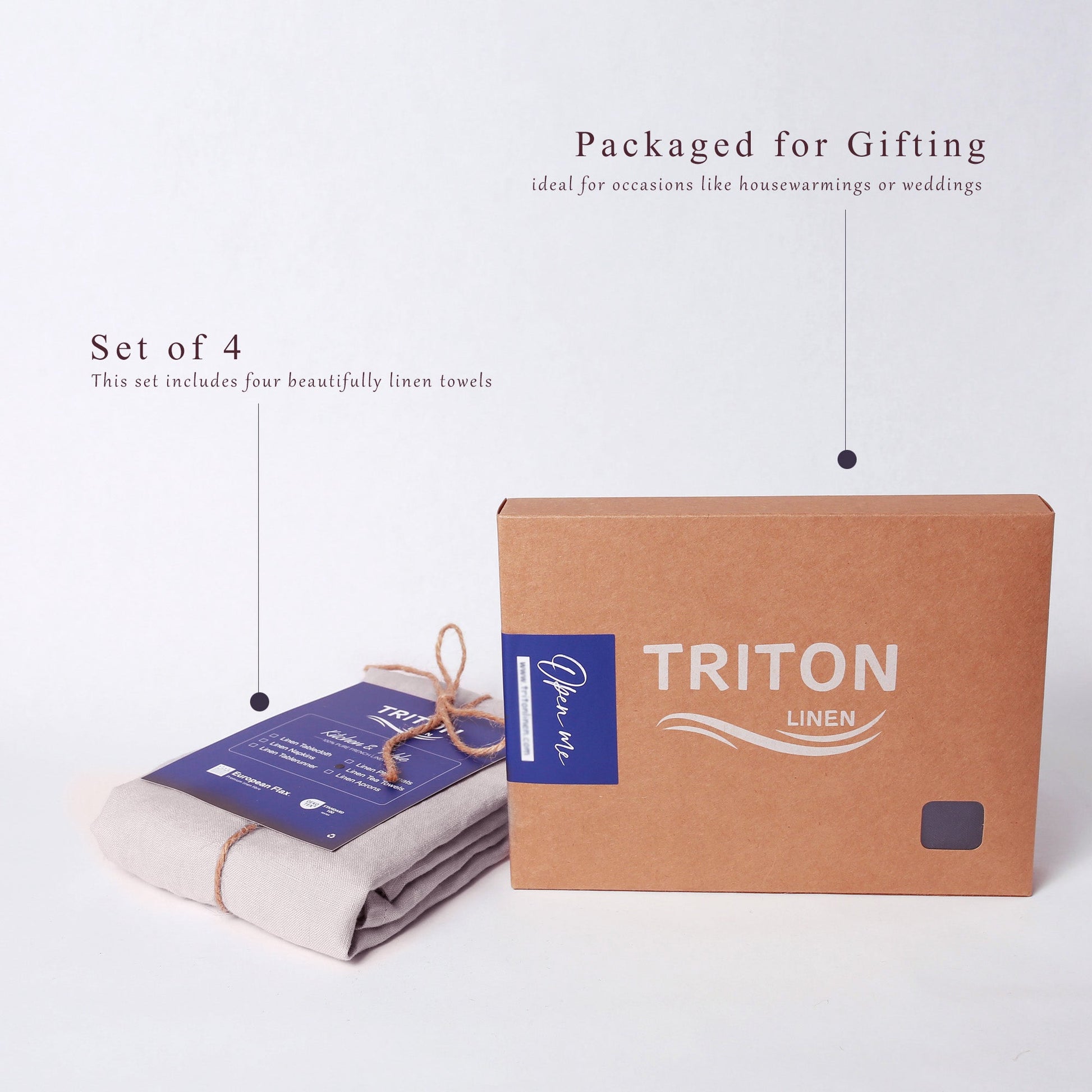 A gift set of four linen tea towels from Triton Linen, shown with its packaging. One towel is neatly folded and wrapped in brown twine with a blue paper label, while the other three are stacked inside a brown kraft gift box.