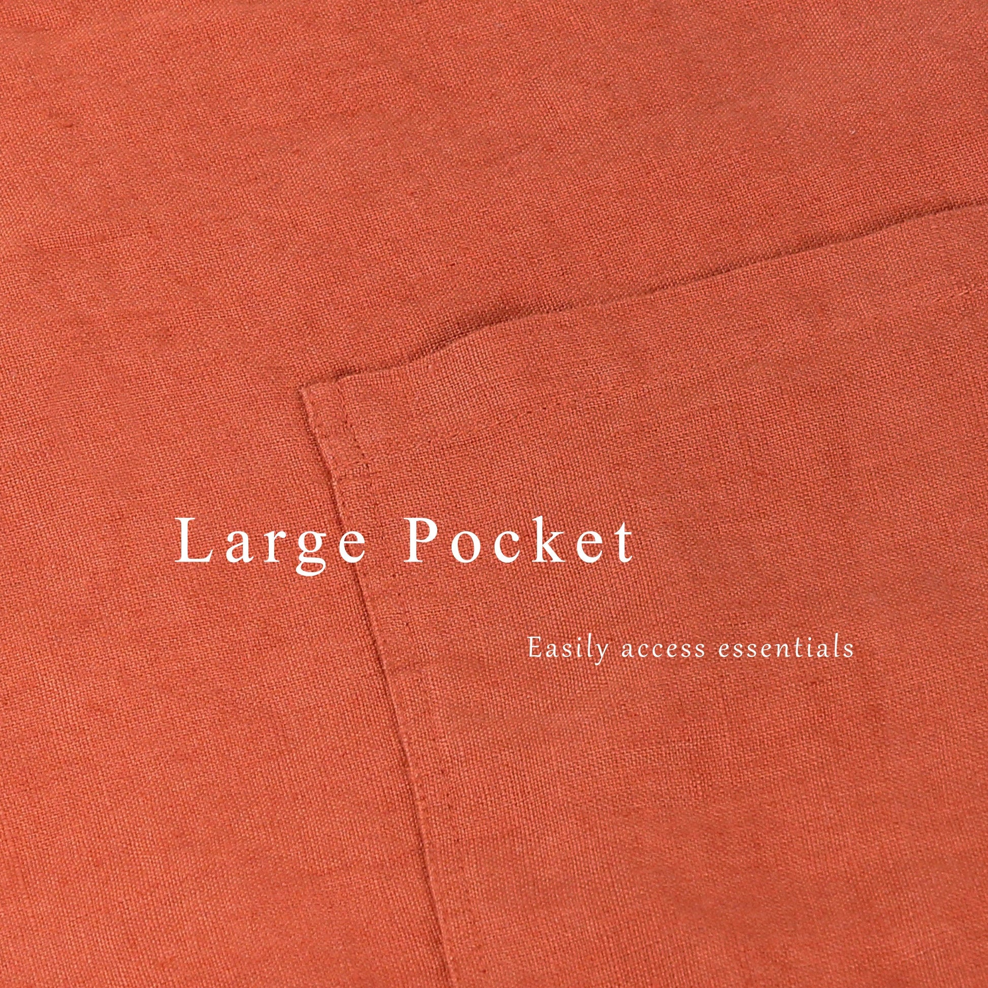 Close-up of a rust-orange fabric surface with a stitched pocket and overlaid text reading 'Large Pocket' and 'Easily access essentials.'.