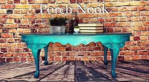 EXAMPLE: Oval coffee table w/ "The Real Teal", distressed